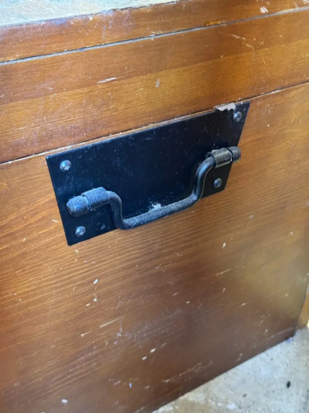 Antique wooden storage trunk